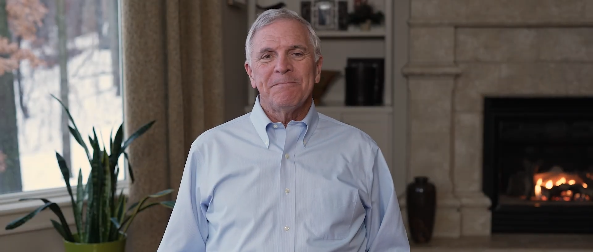 Investment course preview video showing a man analyzing stock charts